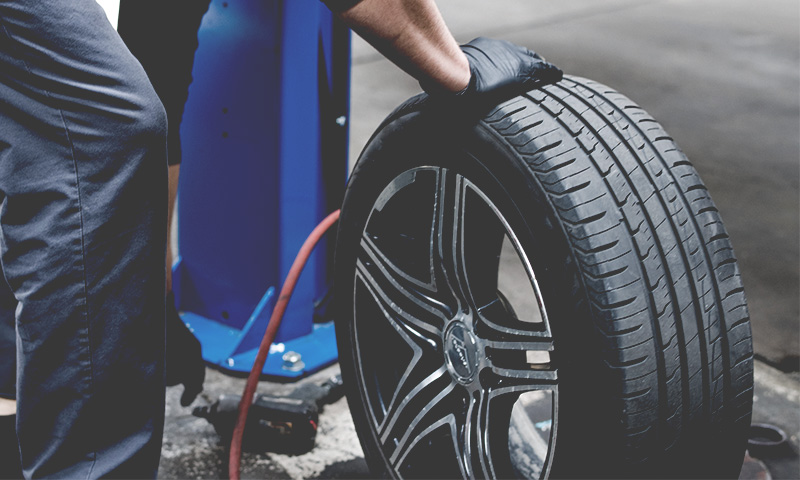 Tire mounting and balancing Mount and balance tires